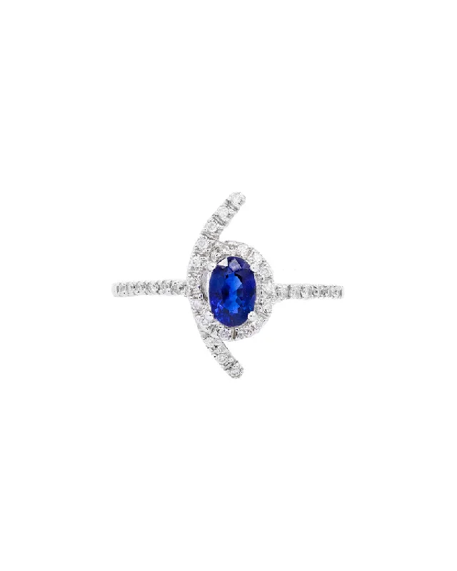 18K RING WITH 0.14CT DIAMOND AND 0.64CT SP