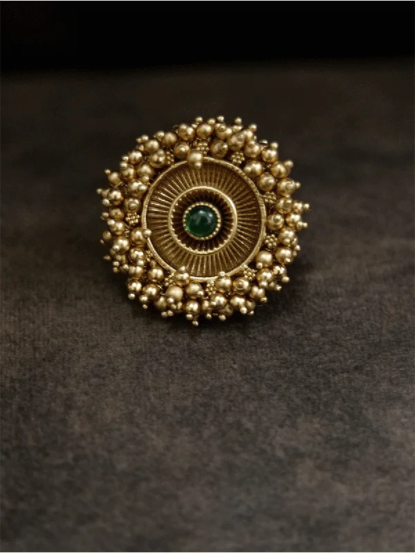 Antique gold finish adjustable ring with beaded lace on edge and stone in the middle