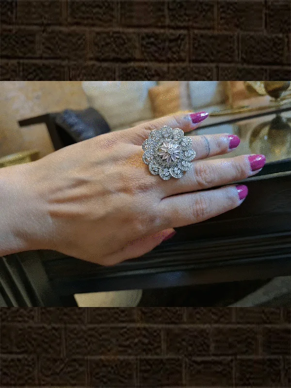 White finish flower design AD ring with light pink stone flower in the center